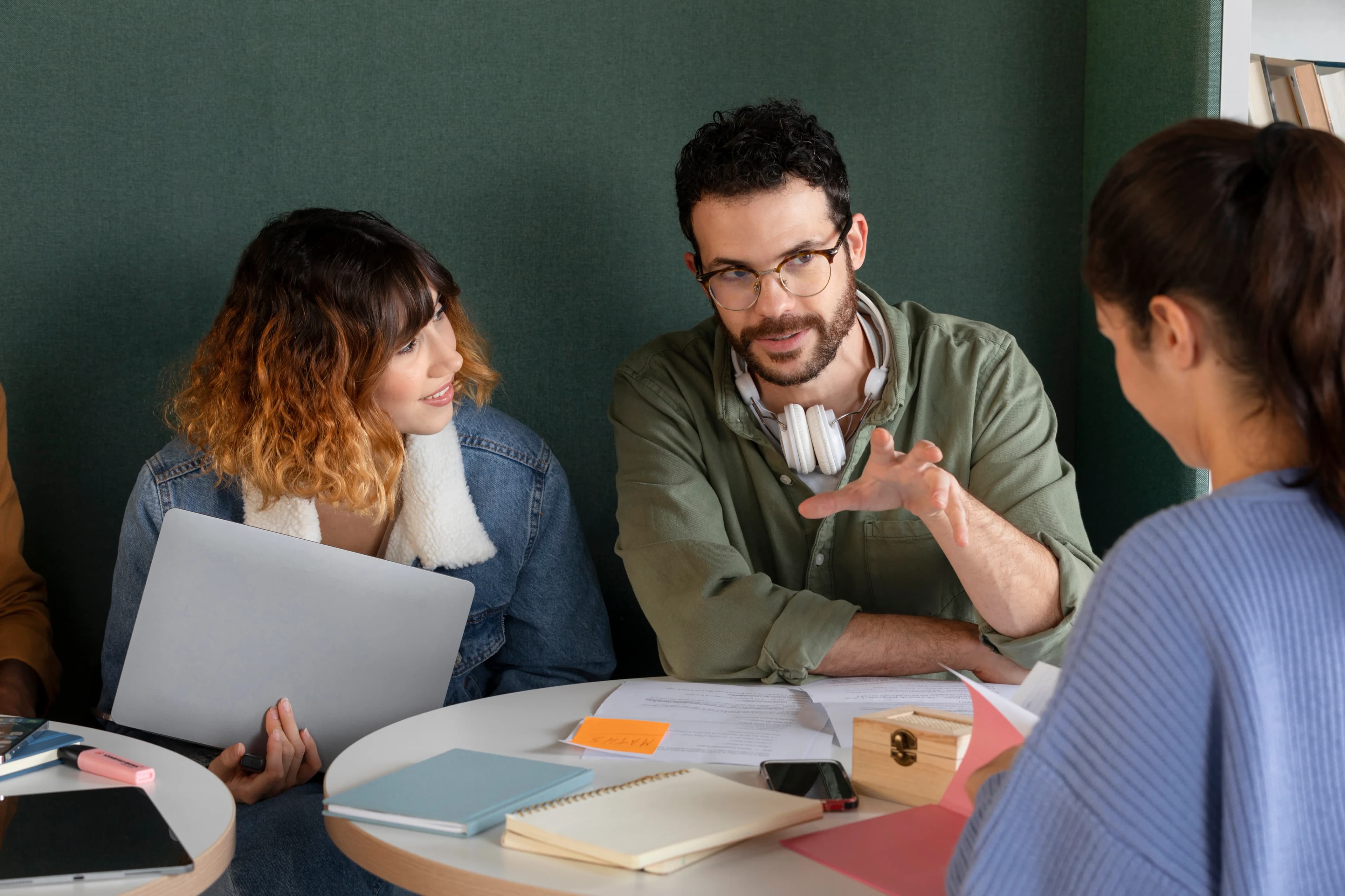 People talking at desk